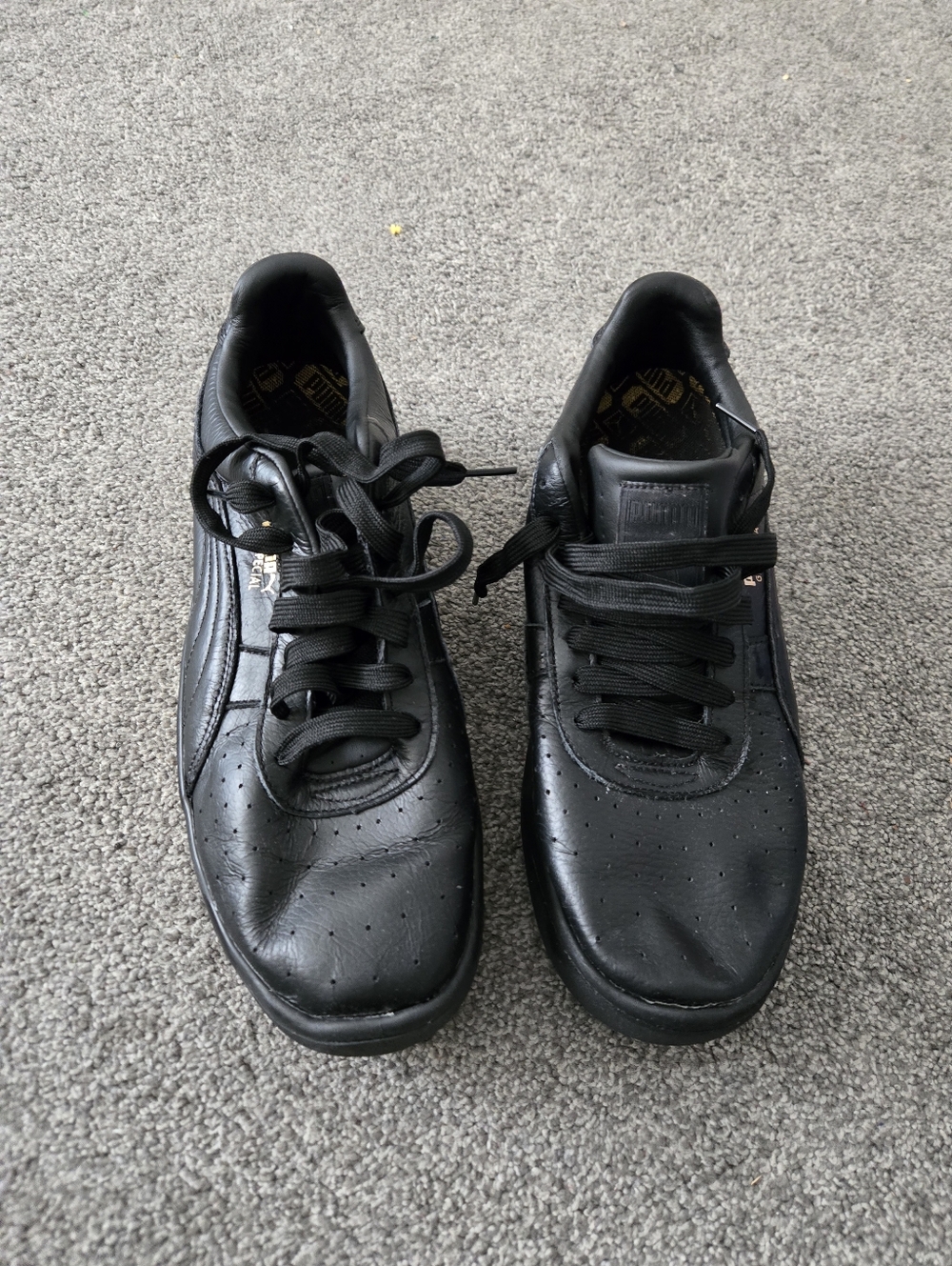 Puma Men’s All-Black Leather Athletic Sneakers